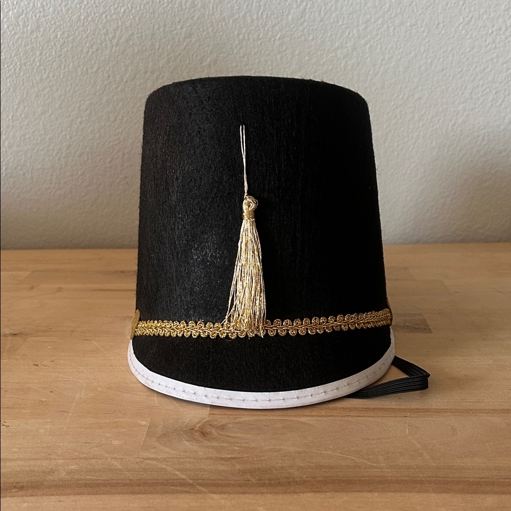 Nutcracker Ballet Soldier’s Hat with Gold Tassel and white trim. One Size.
